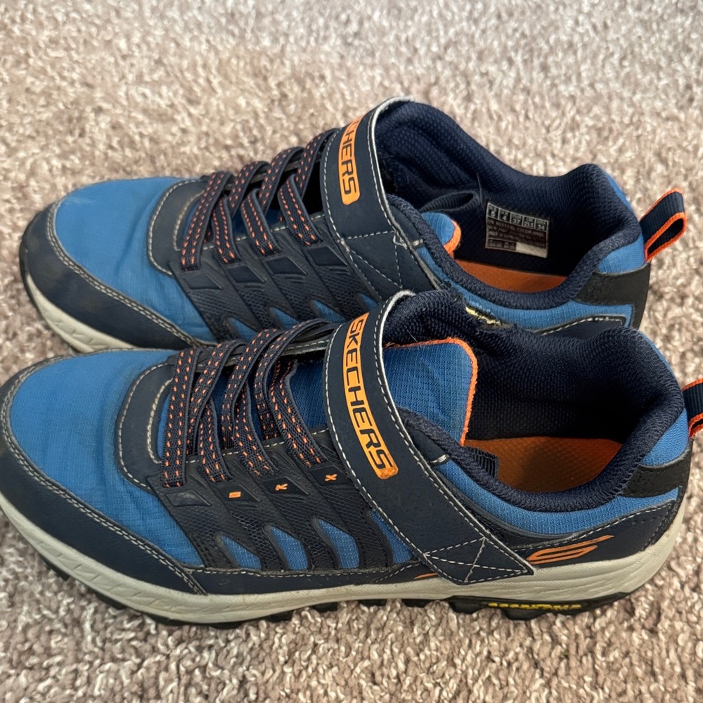 Skechers kid’s Navy and Orange Sneakers